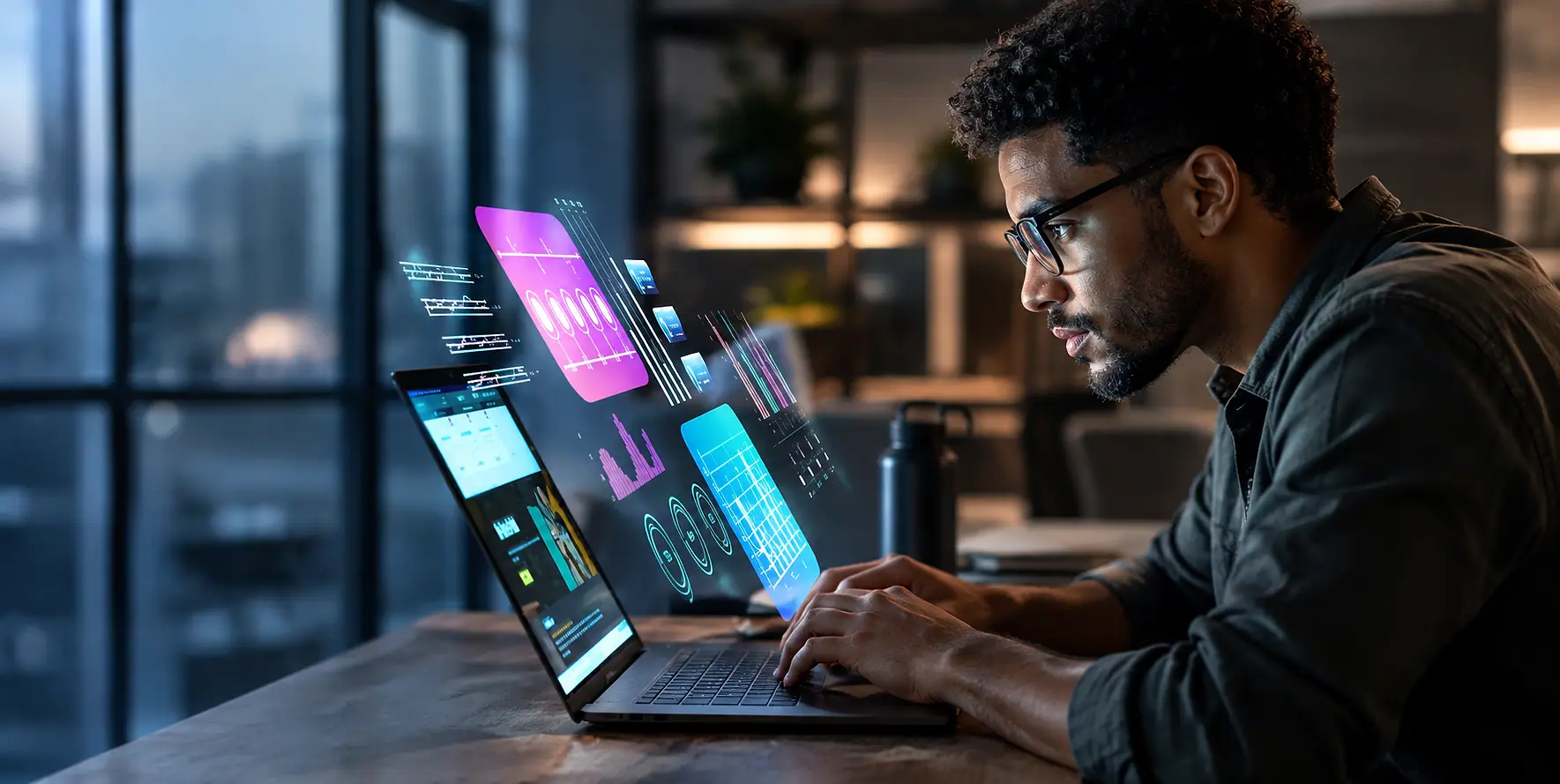 a young black man operating a high-tech system